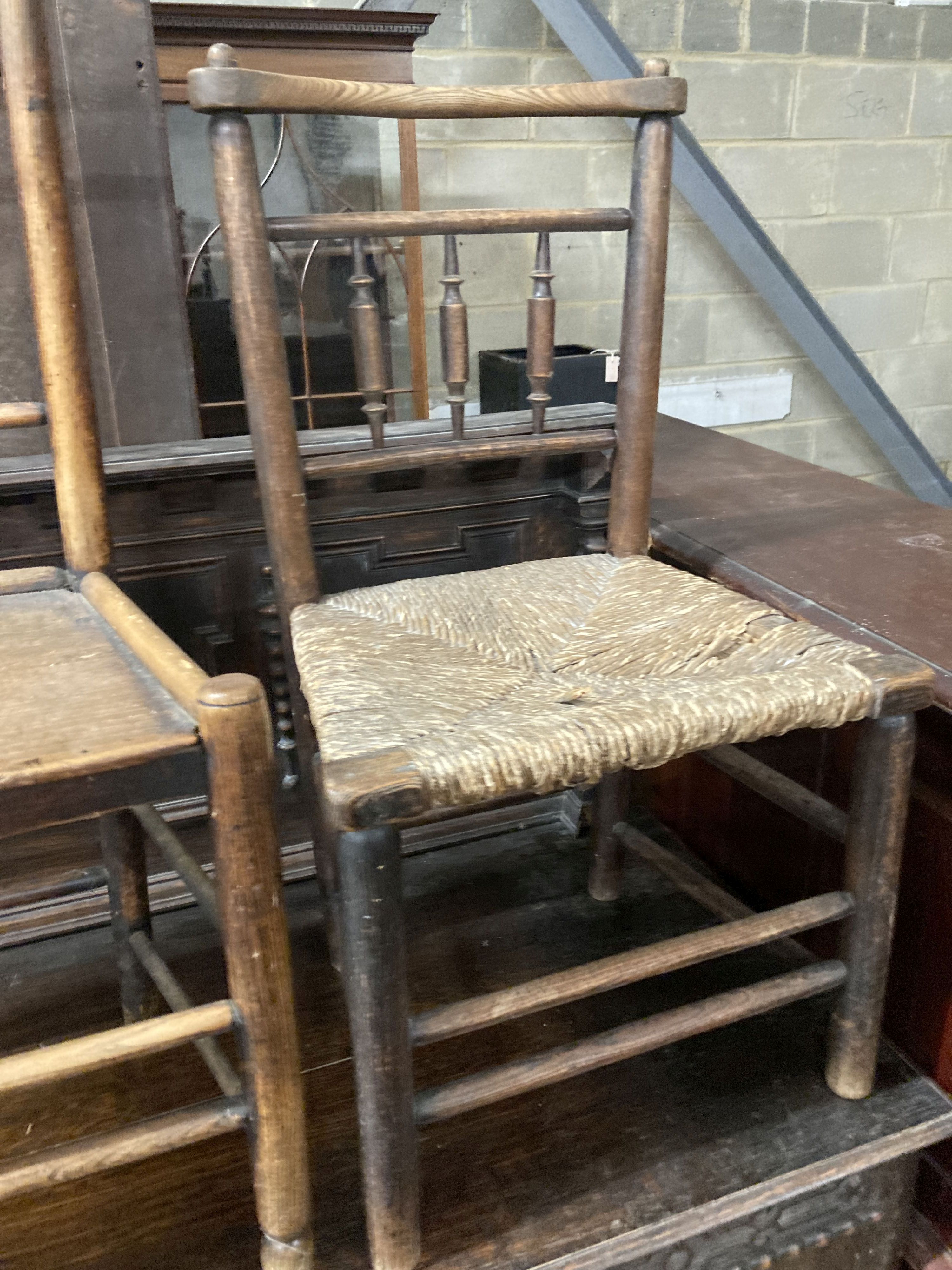 Three 19th century provincial rush and wood seat chairs